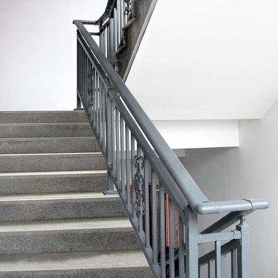 Wall Mounted Glass Stair Handrail with Stainless Steel Pillars and Modern Design Look