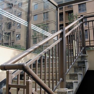 Wall Mounted Glass Stair Handrail with Stainless Steel Pillars and Modern Design Look